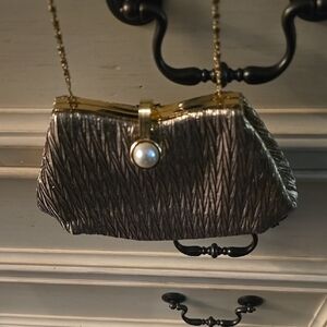 Elegant Metallic Clutch with Gold Chain